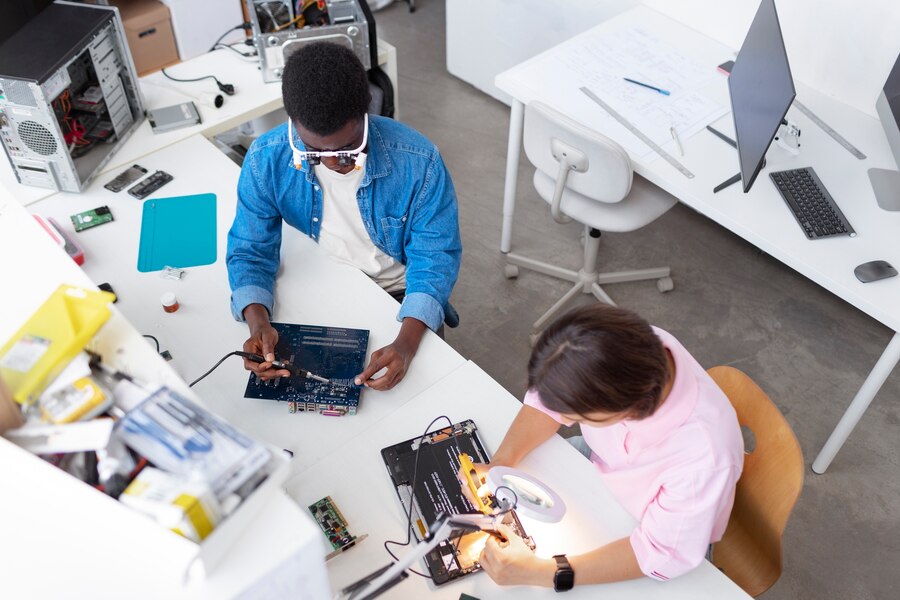 people-repairing-computer-chips_23-2150880943